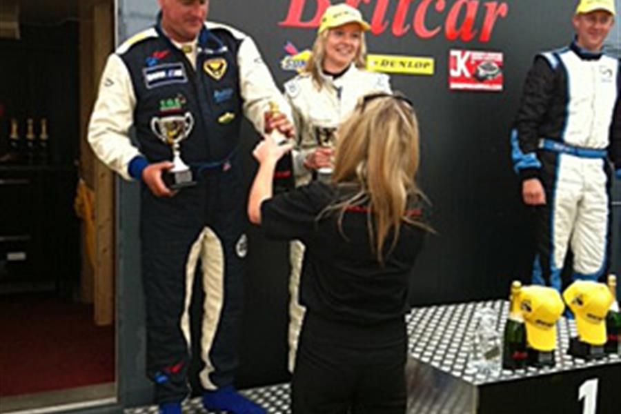Sarah on podium in Adrian Flux BMW M3