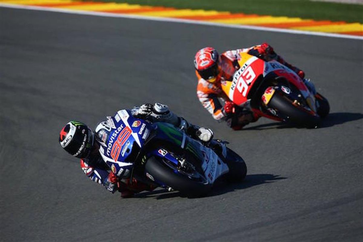 Lorenzo wins MotoGP Grand Finale to become champion