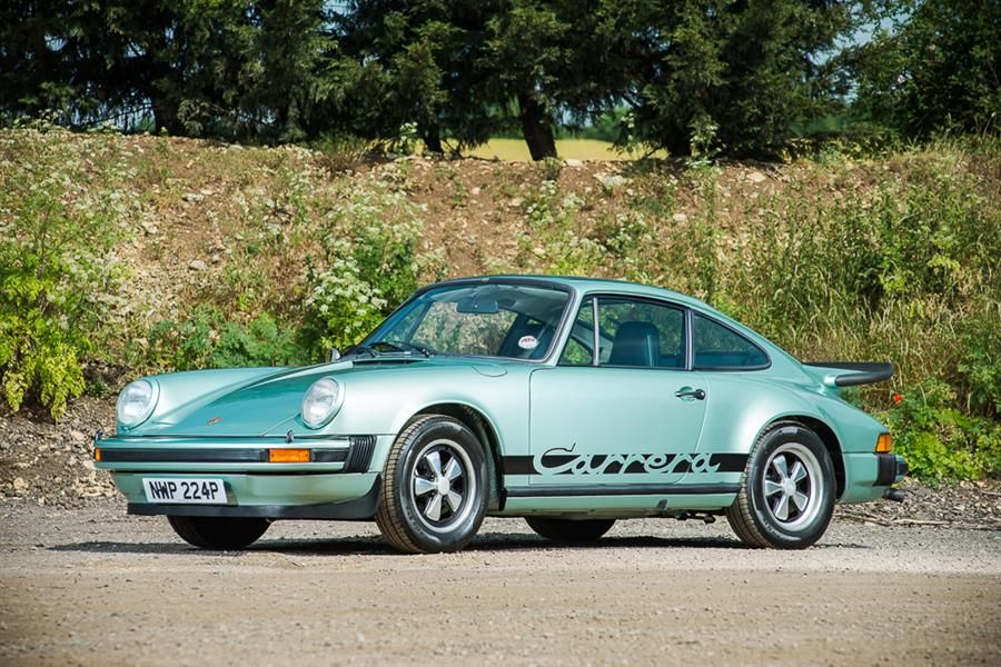 113 classic road cars and 24 race cars under the hammer at Silverstone Classic