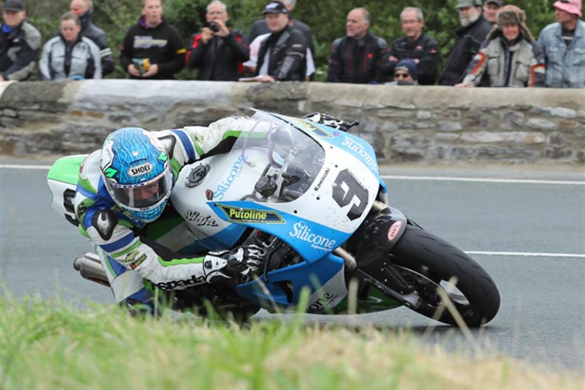 Harrison wins sensational Superbike race as Classic TT records tumble