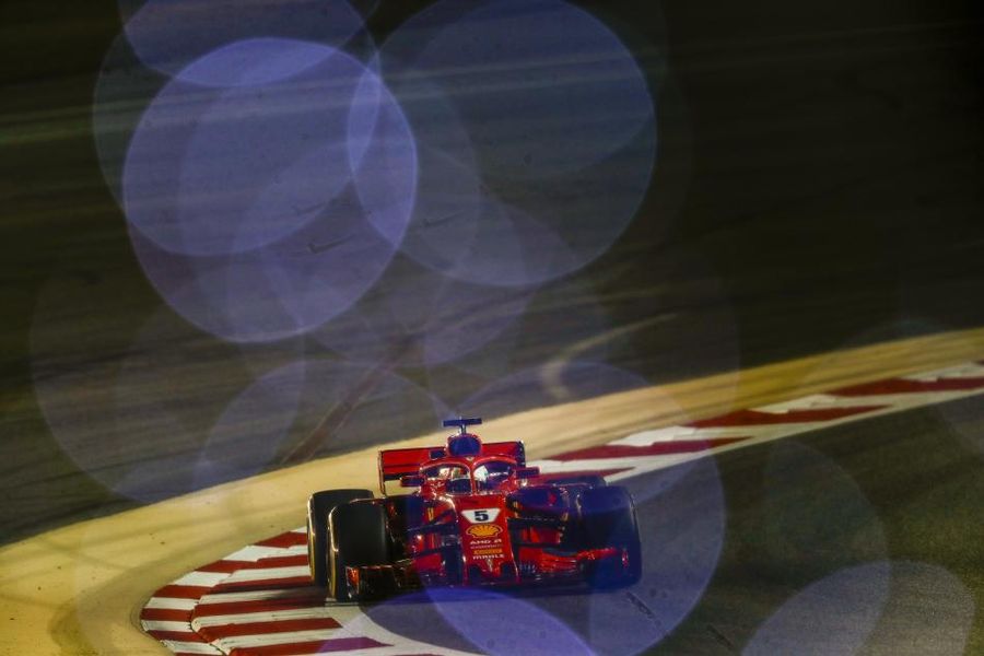 Vettel edges Kimi to claim 51st career pole in Bahrain