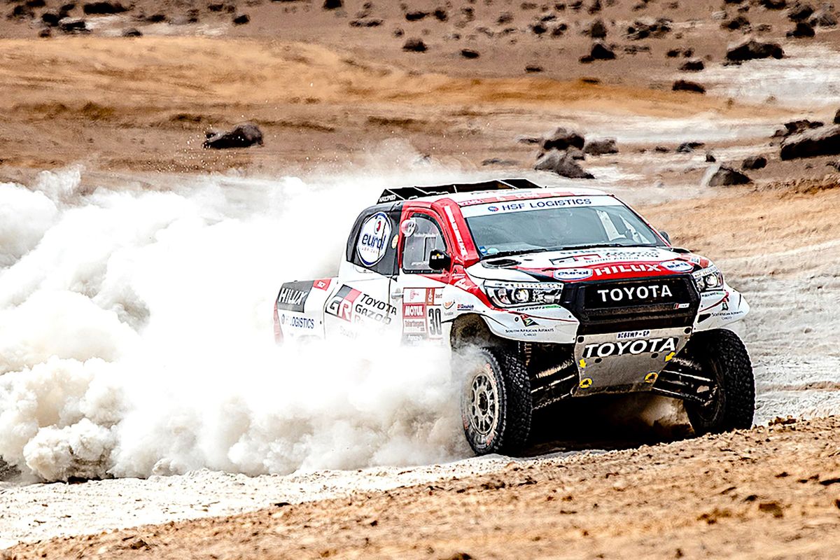 Nasser tightens Dakar grip, Loeb takes day, SA bikers star midway