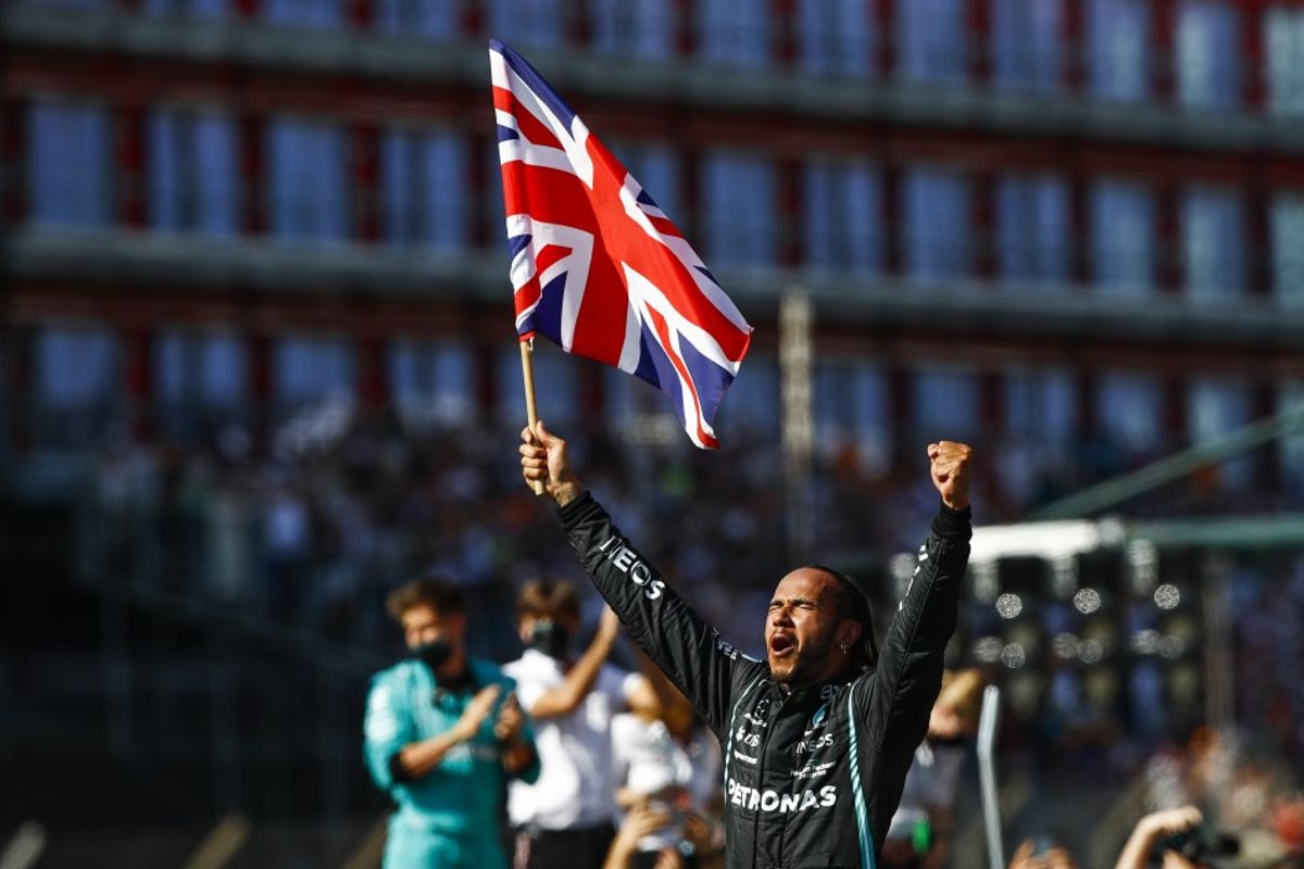 Hamilton overcomes a penalty to win the British Grand Prix