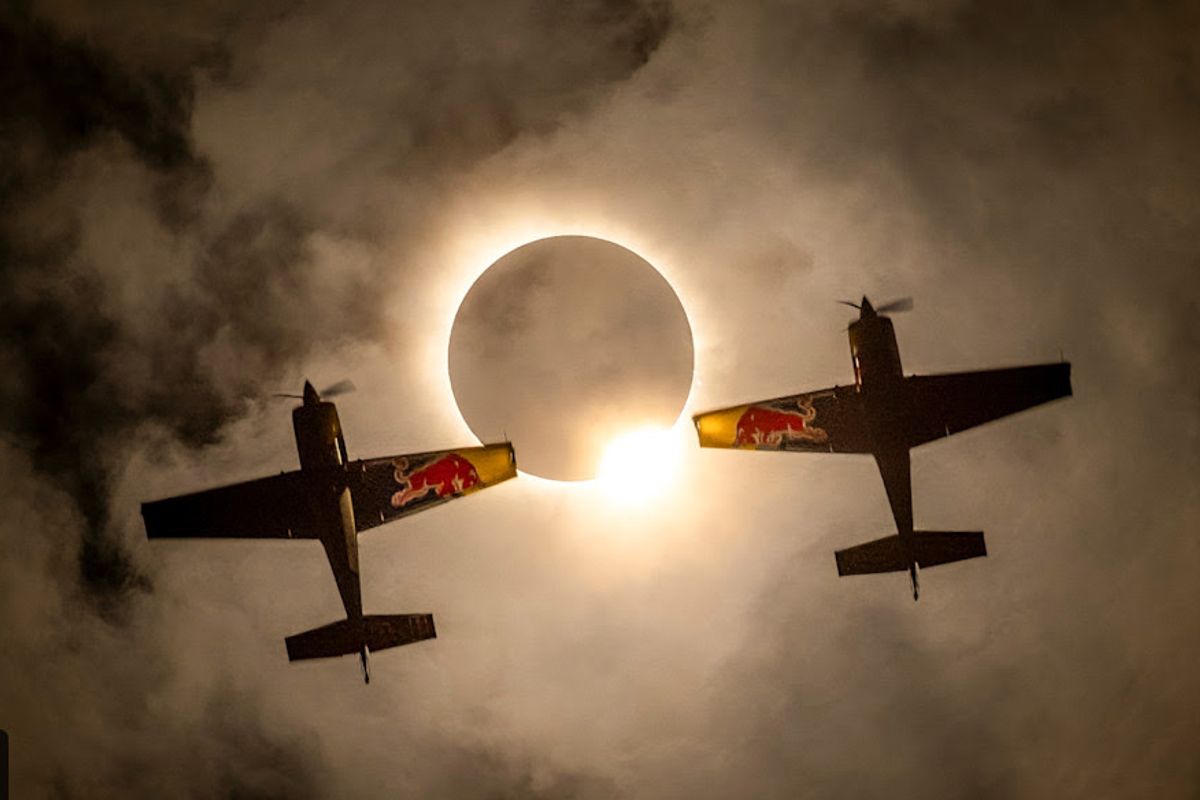 Red Bull Aerobatic Pilots Fly Through Rare Solar Eclipse,